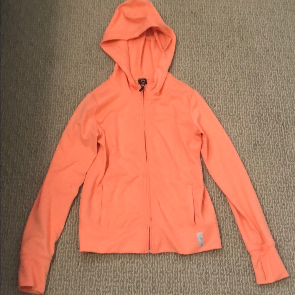 Pink kids workout jacket. With inside pockets.